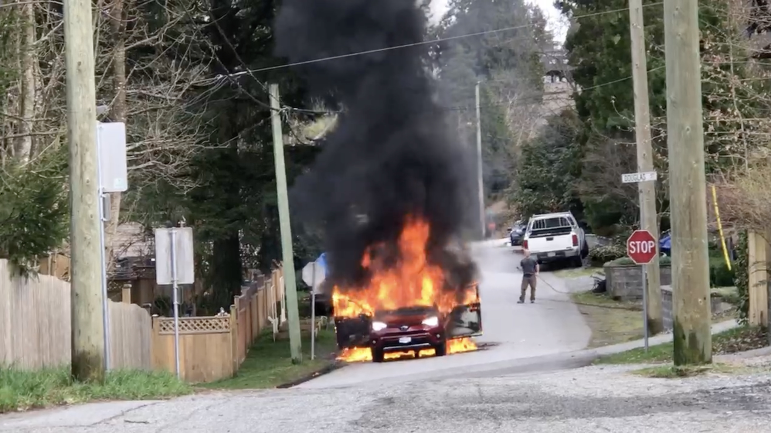 Massimo next to car fire